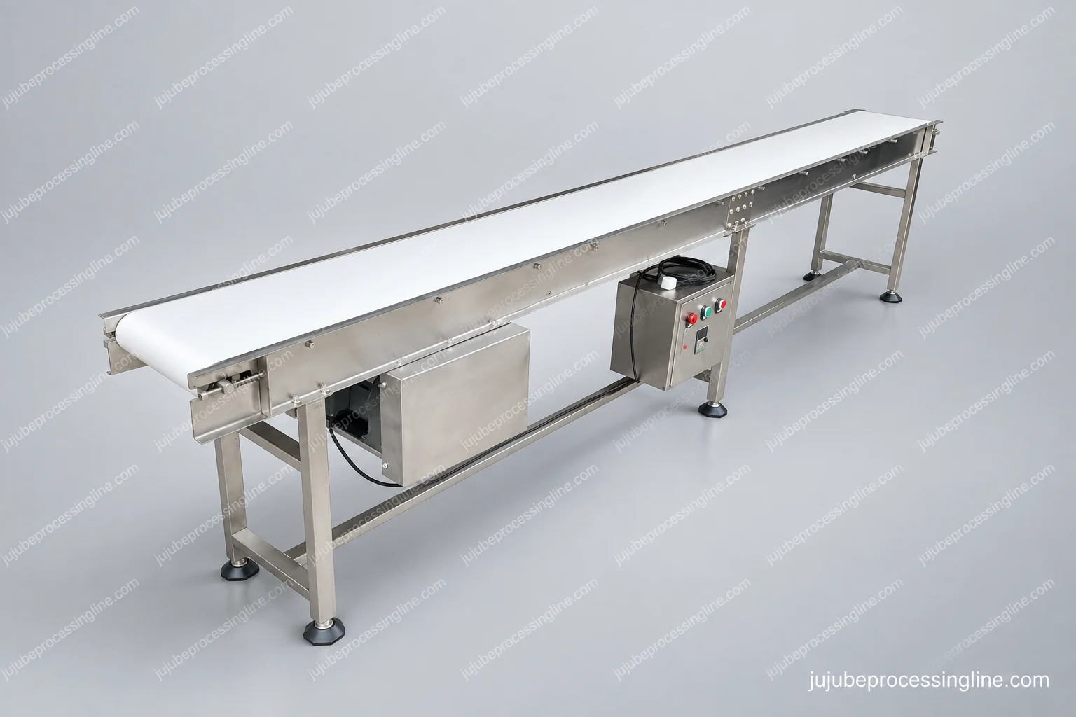 Flat belt conveyor with side frame, end-drive enclosure and local controls.